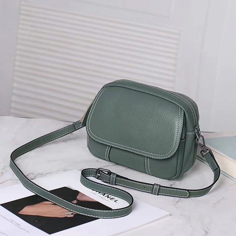 กระเป๋าสะพายข้างหนังวัวแท้ ดีไซน์ Flap เรียบหรู พร้อม 2 สายสะพาย versatile! - Image 9