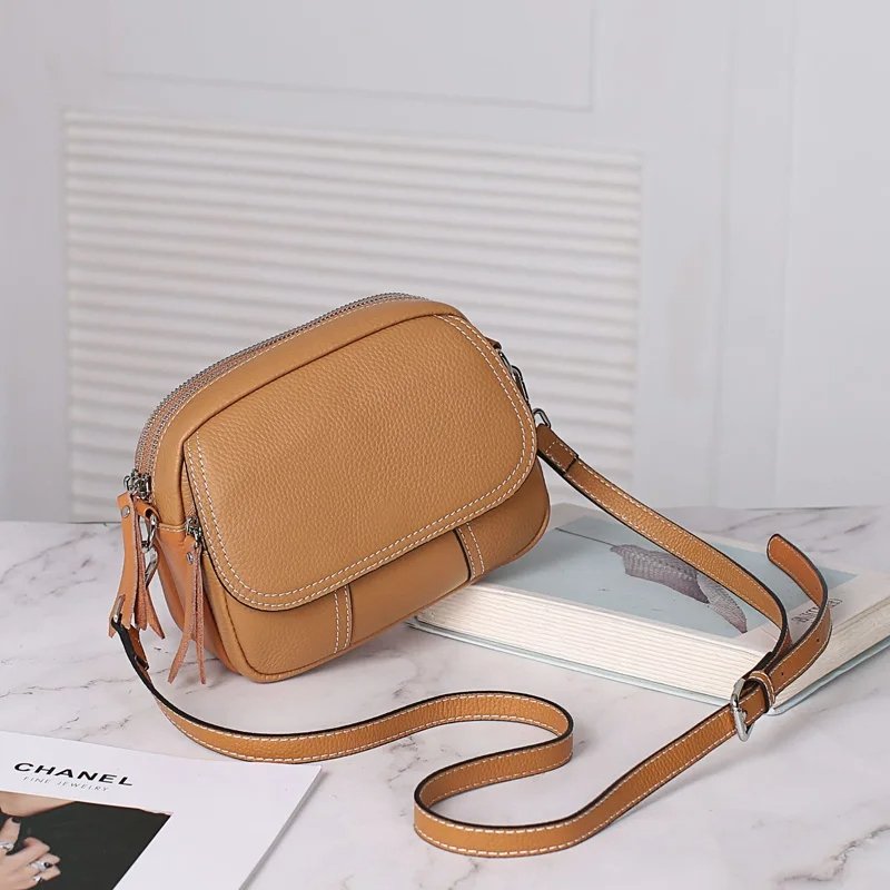 กระเป๋าสะพายข้างหนังวัวแท้ ดีไซน์ Flap เรียบหรู พร้อม 2 สายสะพาย versatile! - Image 3