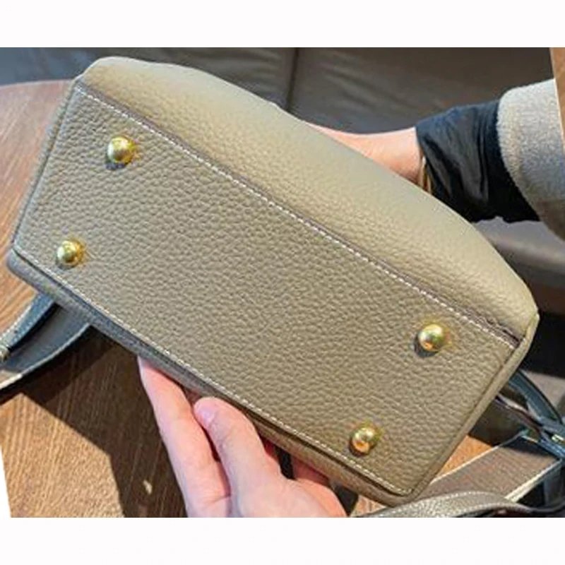 กระเป๋าหนังวัวแท้ TOGO ดีไซน์ Shell สวยหรู พร้อม 2 สายสะพาย! - Image 6