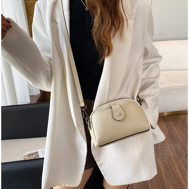 กระเป๋าสะพายข้างหนังวัวแท้ ดีไซน์ Clutches น่ารัก พร้อม 2 ช่องซิป! - Image 15