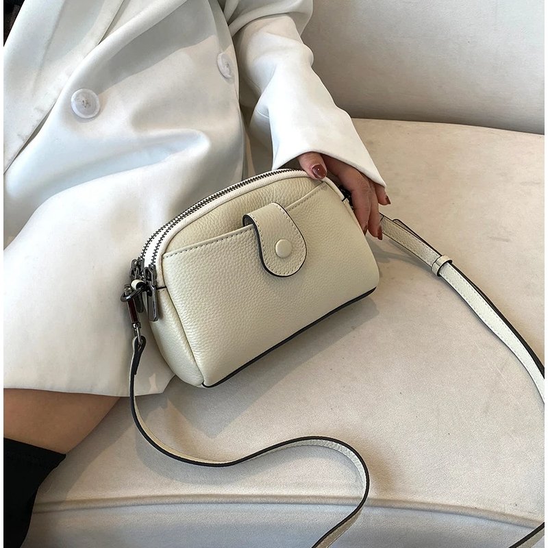 กระเป๋าสะพายข้างหนังวัวแท้ ดีไซน์ Clutches น่ารัก พร้อม 2 ช่องซิป! - Image 14