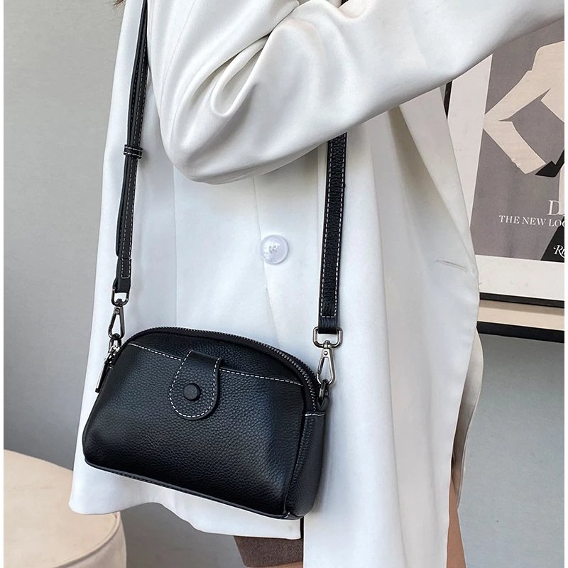 กระเป๋าสะพายข้างหนังวัวแท้ ดีไซน์ Clutches น่ารัก พร้อม 2 ช่องซิป! - Image 16