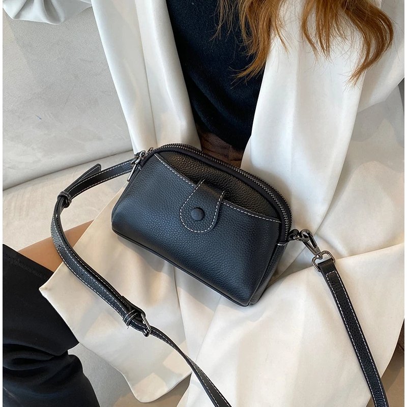 กระเป๋าสะพายข้างหนังวัวแท้ ดีไซน์ Clutches น่ารัก พร้อม 2 ช่องซิป! - Image 18