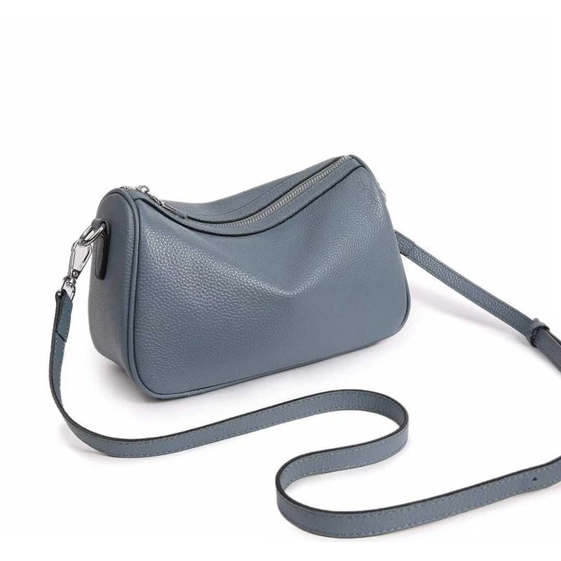 กระเป๋าสะพายข้างหนังวัวแท้ ทรง Barrel ดีไซน์เก๋ไก๋ มอบลุคไม่ซ้ำใคร! - Image 17