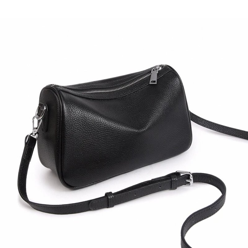 กระเป๋าสะพายข้างหนังวัวแท้ ทรง Barrel ดีไซน์เก๋ไก๋ มอบลุคไม่ซ้ำใคร! - Image 16