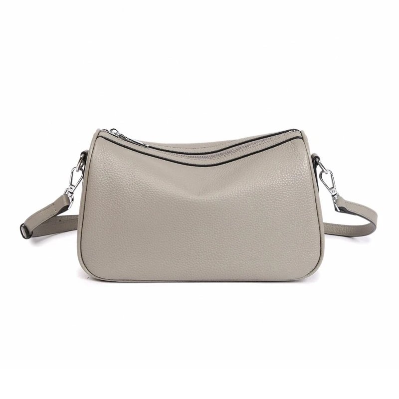 กระเป๋าสะพายข้างหนังวัวแท้ ทรง Barrel ดีไซน์เก๋ไก๋ มอบลุคไม่ซ้ำใคร! - Image 15