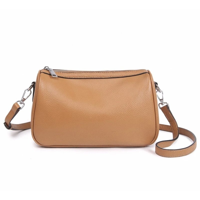 กระเป๋าสะพายข้างหนังวัวแท้ ทรง Barrel ดีไซน์เก๋ไก๋ มอบลุคไม่ซ้ำใคร! - Image 11