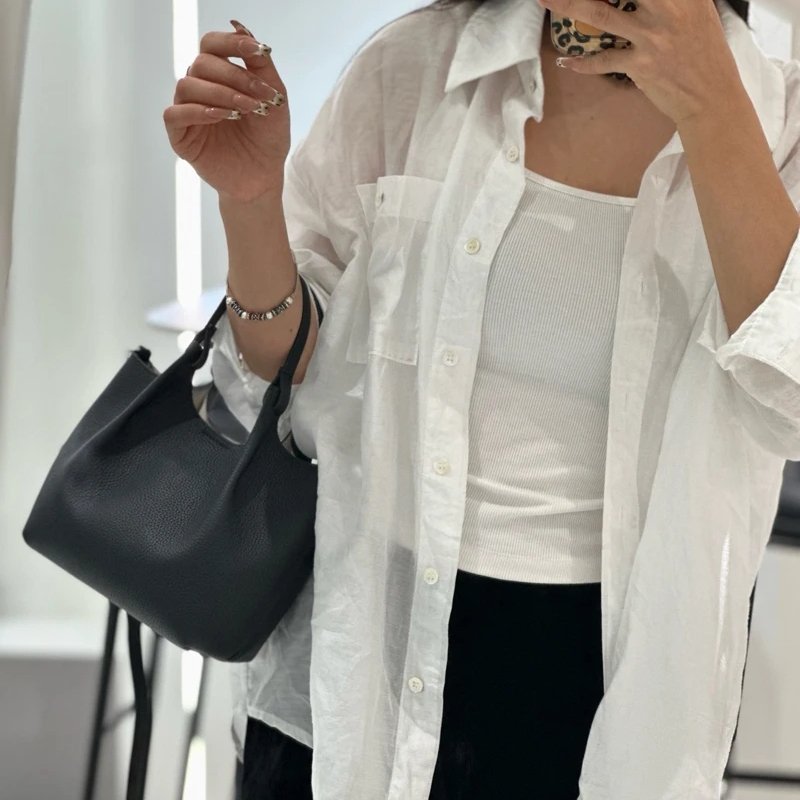 กระเป๋าสะพายข้างหนังวัวแท้ ทรง Saddle ดีไซน์คลาสสิก หรูหราเหนือกาลเวลา! - Image 2